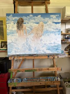 Painting called Joie de Vivre by Banx 1200x900mm MC6822 on the easel, of two young women running into the surf